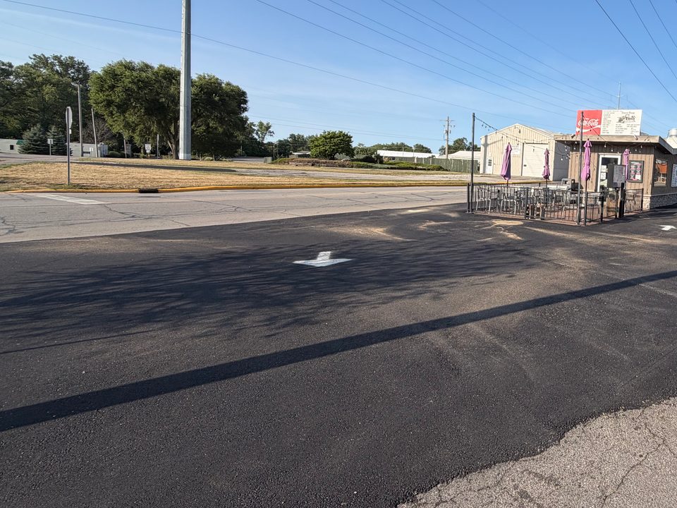 Finished commercial parking lot after asphalt paving