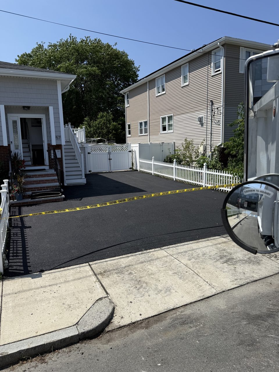 Residential driveway paving in a NH neighborhood